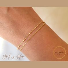 DAINTY CHAIN BRACELET | STERLING SILVER JEWELLERY Gracie is our gold double layered bracelet, featuring a satellite and a plain chain. Perfect for everyday wear or for dressing up on those special occasions WARRANTY This bracelet is covered by our 6 month warranty SIZES S/M is 16cm plus 3cm extension chain M/L is 18cm plus 3cm extension chain DETAILS Made from 925 sterling silver with 18K light gold plating Balls measure approx 2mm PACKAGING Your new jewellery will arrive in a free pouch SHIPPING £1.99 UK shipping via Evri £6.99 International via Evri We aim to ship within 2 days of ordering. If you need it faster, please send us a message and we will see what we can do GIFTING If your order is a gift and being posted directly to the recipient, mark it as a gift and feel free to leave a me Dainty Gold Sterling Silver Bracelet, Double Chain Bracelet Jewelry Gift, Gold Double Chain Bracelet As Gift, Gold Double Strand Beaded Bracelet Gift, Gold Double Strand Beaded Bracelet For Gift, Minimalist Gold Sterling Silver Bracelet As Gift, Dainty Double Band Gold Jewelry, Gold Satellite Chain Bracelet Gift, Minimalist Double Chain Bracelet For Gift