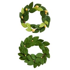 two wreaths made out of leaves and nuts