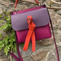 Feminine multicolored medium-sized bag made of genuine leather with original design. Unlined interior. Closed with a magnet. Has a decorative bow. Inside there is a spacious zip pocket. Wide shoulder strap (125cm (49,2 inches)) is adjustable. Bag size 24 * 19 * 5cm (7,9 * 7,5 * 2 inches) The bag can be sewn from any leather in our palette, as well as from various leather combinations. Modern Pink Flap Bag With Detachable Handle, Modern Double Handle Box Bag For Gift, Modern Double Handle Box Bag As Gift, Modern Pink Satchel Flap Bag, Modern Pink Flap Shoulder Bag, Pink Flap Bag With Detachable Double Handle, Pink Flap Bag With Double Handle And Removable Pouch, Pink Double Handle Flap Bag With Removable Pouch, Pink Flap Tote Bag With Detachable Handle