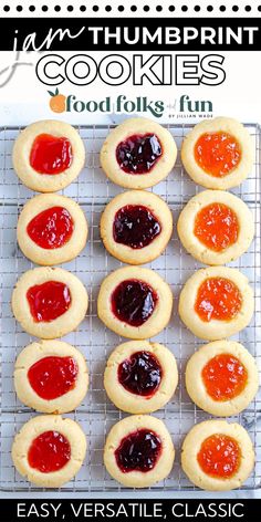 cookies with jelly filling on top are cooling on a wire rack in front of the words, easy and thimbing cookies food folks fun