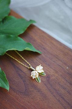 🌸 **Resin Lily of the Valley Necklace - A Delicate Tribute to Nature's Beauty** 🌸 ✨ **Description   Celebrate the graceful elegance of the **Lily of the Valley** with this exquisite **Resin Pendant Necklace**. Handcrafted with fine wire shaped into the delicate white flowers of the Lily of the Valley, and filled with clear resin (no real flowers used), this **nature-inspired necklace** brings the beauty of the outdoors into a timeless piece of jewelry. Whether you're searching for a meaningful **gift for her or a special piece for yourself, this necklace is perfect for those who appreciate delicate floral designs. 🌿 🌸 **Key Features   - **Handmade Shaped wire forms the intricate Lily of the Valley flowers, filled with clear resin   - **Elegant Design Inspired by the purity and charm of Lily Of The Valley Jewelry, Nature Description, Lily Of Valley, Nature Themed Wedding, Meaningful Gifts For Her, Lily Of The Valley Flowers, Resin Pendant Necklace, Nature Necklace, Flower Pendant Necklace