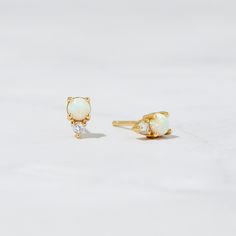 Beautifully crafted opal stud earrings featuring a small opal and cubic zirconia stone. * Made of 925 Sterling Silver * Available in 14k Gold, Rose Gold or Rhodium Plated * We use a THICK PLATING for a piece that will be in your jewelry box for years to come! * Measures 6.5 x 4 mm * Sold as a PAIR * Lab Created Opal Stones ✈️READY TO SHIP! Ships out same day, for quick delivery. Domestic Orders arrive in 2-3 days. Int'l Orders approx 5 days. ♥︎ ♥︎ ♥︎ Model Details ♥︎ ♥︎ ♥︎ 2nd Hole- https://www. Opal Pierced Earrings As Gift, Opal Earrings For Gift, Opal Earrings Perfect For Gifts, Pierced Opal Earrings For Gifts, Fine Jewelry Opal Earrings For Gift, Minimalist White Opal Earrings, Opal Gemstone Earrings For Anniversary, Single Opal Earring As A Gift, Dainty Opal Earrings For Wedding