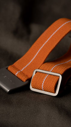 The parachute-style strap is representative of a time in watch history, properly known as The Marine Nationale Parachute Elastic Strap, has an interesting history that dates back to the 1960s and 1970s. The parachute strap is elastic, breathable and fully adjustable, perfect for everyday wear⁠.⁠ Japanese Gate, Nike Logo Wallpapers, British Style Men, Handmade Watch Strap, Limbic System, Handmade Watch, Hip Hop And R&b, The Marine, Interesting History