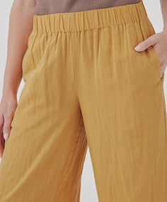 Women's Mustard Coastal Double Gauze Wide Leg Pant 2XL. Super soft organic women's Coastal Double Gauze Wide Leg Pant from Wear PACT. Fair Trade Factory. GOTS Certified Organic Cotton Relaxed Fit Trousers With Comfort Waistband, Summer Straight Pants With Pull-on Style, Ankle-length Pants With Comfort Waistband And Relaxed Fit, Relaxed Fit Ankle-length Pants With Comfort Waistband, Spring Bottoms With Comfort Waistband And Relaxed Fit, Summer Wide Leg Pants With Comfort Waistband, Chic Wide Leg Bottoms With Comfort Waistband, Summer Workwear Pants With Comfort Waistband, Summer Wide-leg Pants With Comfort Waistband