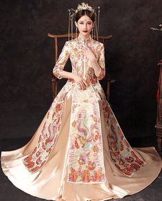 ⭐ Premium Handmade Item, High End Quality Gown; The very Elegant quality for Brides; ⭐ Item High Light: Classical Red Color; 4D Solid Tailor to Show Bride's Shape Beauty; Premium Satin Material Surface; Embroidery Golden Pattern盘金绣; Tassel jewelry decoration in front Chest and Sleeves/ Hemline; Tassel Satin with Pattern Skirt; Symmetrical Art design to show the beauty of Chinese Royal Wedding Fashion. ⭐ Made for Spring/Summer/ Autumn Season; Clothing Match Tips: Match to Loose Qipao Jacket/ High Brocade Wedding Dress With Floral Embroidery, Traditional Brocade Dress With Floral Embroidery, Wedding Dress With Floral Embroidery In Brocade, Wedding Brocade Dress With Floral Embroidery, Traditional Long Skirt Dresses For Spring, Embroidered Floor-length Wedding Dress For Traditional Ceremonies, Multicolor Embroidered Wedding Gown, Brocade Ball Gown Wedding Dresses, Brocade Ball Gown For Wedding