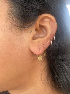 Sometimes simple is best. These ultra lightweight petite dangles are ideal when you just want a tiny bit of movement and shimmer on your ears. These earrings also utilize a lighter weight ear wire, so are also ideal for people newer to wearing dangle earrings. Simple Tiny Everyday Piercings, Hypoallergenic Small Hoop Earrings In 14k Gold Filled, 14k Gold Filled Dangle Cartilage Earrings, Minimalist 14k Gold Hypoallergenic Earrings, Simple Everyday Gold Piercings, Everyday Dangle Hoop Earrings For Pierced Ears, Minimalist Dangle Cartilage Earrings, Dainty Tiny Cartilage Earrings For Everyday Wear, Everyday Dangle Hoop Earrings