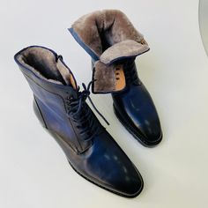 Buy TucciPolo Mens handmade Luxury Italian leather Winter Fur Navy Blue dress Boots. Handcrafted for the classy gentleman in mind. Get your pair today Leather : Italian calf skin leather with Fur Color: Navy Blue This is a made-to-order product. Each pair will be made upon receipt of order and shipped in approximately 15 days. Because our boots are hand-painted and couture-level creations, each shoe will have a unique hue and polish, and exactly as photo. * If you want this product in another co Blue Plain Toe Boots For Formal Occasions, Formal Blue Plain Toe Boots, Classic Blue Business Boots, Classic Blue Boots For Business, Elegant Blue Boots For Formal Occasions, Elegant Blue Formal Boots, Formal Winter Boots Goodyear Welted, Luxury Fitted Winter Boots, Formal Fitted Blue Boots