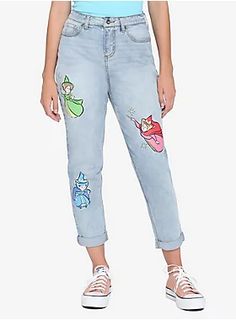 Always wanted a fairy godmother? Now you've got three! From  Sleeping Beauty , these light wash mom jeans fit just the way you like them and have patches of Flora, Fauna and Merryweather on front. 97% cotton; 1% spandex; 2% other fiber Wash cold; dry low Imported Listed in junior sizes Mommy And Me Frozen Shirts, Arm Sleeve Disney, Disney Mom Sweaters, Disney Cute Clothes, Disney World Shirts Frozen, Womens Disney Clothes, Dresses To Wear To Disneyland, Disney Princess Modern Clothes, Mommy Daughter Shirts Disney