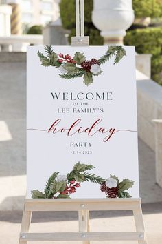 an easel with a sign that says welcome to the family's holiday party