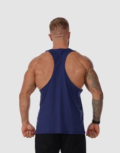 The ultimate workout companion for your lifting sessions. Crafted from 100% pure cotton, this stringer is designed with a relaxed, loose fit, offering freedom of movement comfort and breathability during your workouts. The soft cotton fabric feels gentle against the skin, reducing irritation and allowing you to focus solely on your performance. Its durable material promises long-lasting wear, while the comfortable fit makes it perfect for everyday training. Model: Straten is 6.1” and wears size Functional T-back Activewear For Training, Solid T-back Activewear For Gym, Solid Activewear For Summer Gym, Solid Summer Activewear For Gym, Solid Color Summer Gym Activewear, Athleisure T-back Top For Training, T-back Tank Top For Sports, Solid T-back Tank Top For Sports, Cotton Tank Top For Gym