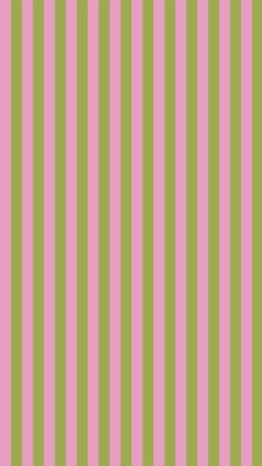 a pink and green striped wallpaper with vertical stripes