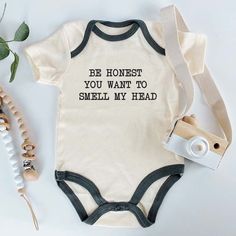 Dress your little one in laughter with this Funny Baby Bodysuit! Perfect for newborns and infants, this adorable and humorous bodysuit is made from soft, high-quality fabric, ensuring comfort and cuteness. Ideal for baby showers, everyday wear, or as a playful gift, this bodysuit brings joy and smiles wherever your baby goes. Make a statement with this charming and comical outfit! This baby bodysuit is machine washable, making it easy to care for. The romper is super soft and easy to wear and take off, with a snap closure. This bodysuit is designed and created by a mom who is passionate in creating playful, cute, and trendy design. 100% handmade with love and care for your little one! ✅ PRINTING TECHNOLOGY: Direct to Garment printing, full-color digital printing, bright colors, realistic p Birthday Baby Announcement, Traditional Baby Clothes, Personalized Baby Clothes, Funny Baby Clothes, Funny Baby Onesies, Pregnancy Reveal, Brings Joy, Newborn Outfit, Unisex Baby Clothes