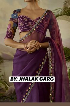 PURPLE ORGANZA HAND EMBROIDED SAREE.  Purple Saree Set that captivates with its elegance. The eye-catching piece is crafted in organza with cutwork and zardosi hand embroidery. It is paired with a modal satin printed blouse piece. Accessorise the designer saree set with statement earrings and heels for a festive occasion.  #Beautiful#Lovely#Grace#Elegant#FestiveWear#SareeAura#Style#Look#Trending#theColour. Saree Borders Ideas, Sangeet Outfit Saree, Chiffon Blouse Designs For Saree, Saree Border Work Designs, Blouse Designs Organza Saree, Printed Saree Blouse Design, Organza Sarees Blouses Design, Blouse For Organza Saree, Modern Blouse Designs Saree