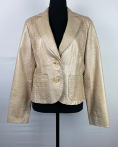 "Such an unusual piece, all in the details! THE DETAILS: Creamy beige undertones with bronze/copper detail within the alligator print, lined, fitted/tailor cut, at hip length, front button closure, front flat pockets ~ Era: 00's ~ Material: 100% Leather ~ Garment Tag Size: 8 ~ Today's Fit Guesstimate: S/M ~ Condition:  Excellent, no flaws ~ Brand: Neiman Marcus ~ Pockets: yes ~ Shoulder pads: yes MEASUREMENTS (Flat Lay): ~ Bust/Pit to Pit 19\" ~ Waist 17 1/2\" ~ Length 23\" *Compare personal mea Chic Gold Blazer For Semi-formal Occasions, Elegant Gold Blazer For Business, Elegant Tailored Gold Blazer, Luxury Gold Blazer For Office, Gold Fitted Luxury Blazer, Elegant Gold Blazer For Semi-formal Occasions, Designer Gold Blazer For Work, Designer Gold Blazer For Business, Designer Gold Blazer For Semi-formal Events