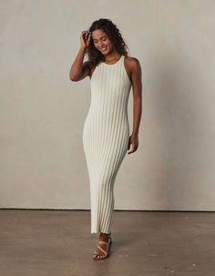 Normal Brand Spring 2024! Crafted from 100% cotton in a wide rib pattern for a flattering form-fitting silhouette in a classic cotton feel. The fine sweater knit is breathable and and adds texture to the mid-weight fabric. With its all-over rib knit, high neck, and side slit, this dress combines timeless elegance with a modern edge. S2VLZAHD Eliza Dress, Henley Sweater, Scarf Top, Ribbed Knit Sweater, Overall Dress, Sweater Knit, Ribbed Sweater, Dress Romper, Long Sweaters