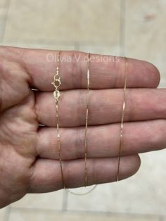 14K Solid Yellow Gold Box Necklace Chain 0.50mm Stamped: 14K Average Weights: *16"   .65 Grams *18"   .73 Grams *20"  .80 Grams *22"  .86 Grams *24"  .95 Grams *26"  1.03 Grams *28"  1.09 Grams *30" 1.17 Grams Lock: Ring Clasp Arrives in a Velvet Gift Pouch and includes FREE SHIPPING to the USA To see more chains and other handcrafted jewelry collections, please visit my storefront here : https://www.etsy.com/shop/OliviaVdesigns About OliviaVDesigns: Thanks for taking a look at Olivia V. Designs  Been doing jewelry all my life. This is my specialty :) I'm a jewelry designer working in my hometown Brooklyn, where I was born and raised. I have a cute workshop in my house where I create all my jewelry and designs. Always trying to create new ideas, infused with classic collection styles Pleas 14k Stamped Link Jewelry For Gift, Stamped 14k Link Chain Necklace Gift, 14k Link Chain Necklace As Gift, 14k Gold Snake Chain Necklace For Gift, 14k Gold Snake Chain Necklace As Gift, Designer Working, Lock Ring, Box Necklace, Simple Chain