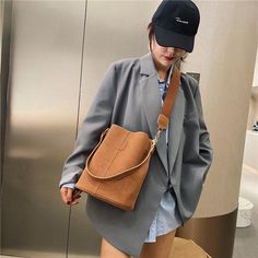 Material: PU Texture: Soft Closed: Buckle Size: 9.1"L x 6.3"W x 11"H in; It is enough to hold daily stuffs including cell phones, sunglasses, wallet, key etc. Baldric: Adjustable shoulder strap Large Capacity Phone Shoulder Bag For On-the-go, On-the-go Bucket Shoulder Bag With Mobile Phone Bag, Casual Phone Bag With Cell Phone Pocket For Office, Trendy Shoulder Bag With Mobile Phone Bag For Fall, Trendy Fall Shoulder Bag With Mobile Phone Pocket, Fall Rectangular Bucket Bag For On-the-go, Trendy Fall Mobile Phone Bag, Trendy Bucket Hobo Bag For Fall, Fall Bucket Shoulder Bag For Daily Use