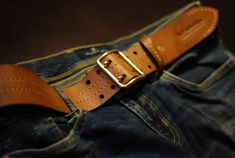 YuTcollectionUA makes leather belts, wallets, cases, and other accessories for men. This brown belt is designed solid, comfortable, and durable. The combination of a premium leather strap and brass buckle creates a product that will serve you for many years. The classic casual belt is one of the most important decorative accessories for men. The rule is simple: if your pants, trousers or jeans have belt loops, wear a belt. Leaving the loops empty looks like you forgot something. That goes especi Everyday Bridle Leather Belts And Suspenders With Removable Belt, Bridle Leather Belts And Suspenders For Everyday Use, Vintage Bridle Leather Belt For Everyday Use, Vintage Belts And Suspenders With Removable Belt, Vintage Belts And Suspenders For Everyday Use, Vintage Leather Belt With Belt Clip, Waist Purse, Leather Suspenders, Jeans Belt