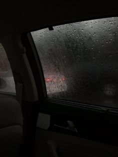 the rain is coming down in the car