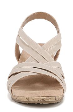 Treat your feet to all-day comfort in this chic strappy sandal balanced on a cork-wrapped wedge with a soft lining and gentle padding. 1" platform Elasticized slingback strap Soft System® comfort package provides all-day support, flex and cushioning Synthetic upper, lining and sole Imported Spring Strappy Wedge Sandals With Arch Support, Strappy Synthetic Wedge Sandals With Arch Support, Synthetic Strappy Wedge Sandals With Arch Support, Comfortable Beige Wedge Sandals With Arch Support, Adjustable Beige Comfortable Wedge Sandals, Beige Adjustable Wedge Sandals With Cushioned Footbed, Beige Synthetic Wedge Sandals With Arch Support, Beige Wedge Heel Sandals With Arch Support, Adjustable Beige Wedge Sandals