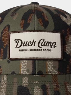 Look good, hunt good in a Duck Camp signature camo hat made of 100% Recycled Materials. Good for you, good for habitat. - Recycled materials make this hat better for everyone without sacrificing performance features- 6-panel structure- Snap back adjustment Camouflage Flat Brim Trucker Hat For Outdoor, Camouflage Hats With Curved Bill For Outdoor Activities, Outdoor Camouflage Baseball Cap, Camouflage Hat With Curved Bill For Outdoor Activities, Outdoor Camouflage Snapback Hat With Flat Brim, Camouflage Snapback Hat With Curved Brim For Outdoor Activities, Outdoor Military Hat With Curved Bill, Military Hat With Curved Bill For Outdoor, Camouflage Curved Brim Hat For Camping