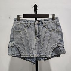 Casual Bottoms With Pockets And Irregular Shape, Fitted High Waist Denim Skirt With Built-in Shorts, Trendy Denim Skirt With Built-in Shorts, Y2k High-waisted Shorts, Y2k High-rise Medium Wash Shorts, Y2k Denim Shorts With Pockets, Y2k Denim Bottoms With Built-in Shorts, High Waist Denim Mini Skirt With Built-in Shorts, Shorts Skirt