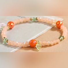 “You’re A Peach” Sparkling Peaches Leaves Beaded Stretchy Adjustable Bangle Bracelet Or Anklet. In Colors Of Pale Peach, Orange, & Green These Faceted Beads Sparkle/Shine In The Light. So Pretty! New. *Also Available In White! If You Want It, Don’t Let It Get Away Send Me An Offer! I Love To Do Bundle Order Discounts! Peach Items, Edgy Bracelets, Peach Bracelet, Peach Orange Color, Elephant Charm Bracelet, Geometric Bangle, Peach Jewelry, Adjustable Bangle Bracelet, Pale Peach