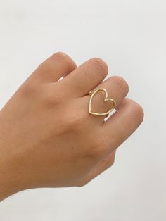 -14k Heart Ring  -100% Gold  -Size 7  -Yellow gold  -Item sold by piece.Weight undetermined. Gold Double Heart Promise Ring, Gold Double Heart Ring For Valentine's Day, Valentine's Day Gold Double Heart Ring, Gold Open Heart Ring Gift, 14k Gold Hallmarked Heart Ring, 14k Gold Rings With Heart Charm, Yellow Gold Heart Ring With Charm, 14k Gold Open Ring For Valentine's Day, Double Heart Yellow Gold Ring