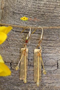 Hammered Dangle Earrings For Anniversary, Gold Nickel-free Long Drop Crystal Earrings, Gold Long Drop Crystal Earrings Nickel Free, Gold Dangle Earrings With Birthstone, Hammered Dangle Chandelier Earrings For Gifting, Hammered Dangle Chandelier Earrings For Gift, Hammered Dangle Chandelier Earrings As Gift, Nickel-free Drop Chandelier Earrings For Anniversary, Adjustable Hammered Earrings For Anniversary