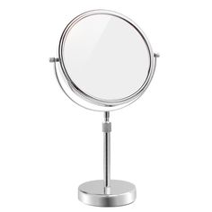 a small round mirror on a metal stand