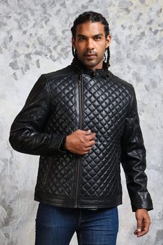 Men's Black Quilted Jacket in Real Leather Men’s diamond quilted jacket is made from finest quality genuine Leather. This padded jacket features quilted pattern on its exterior and sleeves with zipped closure, snap-button collar and comfort inner lining. This leather biker jacket also includes functioning side zipper pockets. This black quilted jacket is not only voguish but also exceedingly comfortable & well-constructed lasting you for all the seasonal changes coming your way Outfit Type: Bike Luxury Black Quilted Jacket For Winter, Classic Diamond Quilted Jacket For Winter, Classic Winter Quilted Jacket With Diamond Quilting, Luxury Quilted Leather Jacket With Long Sleeves, Black Quilted Biker Outerwear, Black Quilted Leather Jacket For Winter, Luxury Quilted Black Leather Jacket, Black Quilted Leather Biker Jacket, Classic Quilted Leather Jacket For Winter