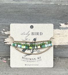 the beaded bird bracelet is on display