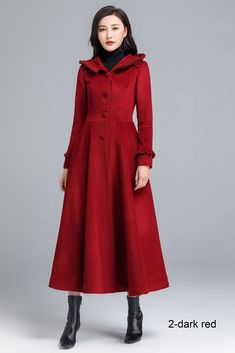 "This stunning long wool coat for womens is beautifully fitted and tailored for a classic, feminine design. It features navy blue, a slim fitting bodice with elongated sleeves and tapered waist band leading into a long, flowing skirt, shoulders and sleeve cuffs have a pretty ruffle detailing that really sets it apart. and thee hooded design will keep you warm and cozy, Lined in imitated silk, this coat also has deep side pockets and a three, fabric-covered button closure, we can custom made this Elegant Hooded Wool Coat For Winter, Mod Clothing, Classic Feminine, Womens Coats, Long Wool Coat, Coat Vintage, Coat Winter, Flowing Skirt, Fabric Covered Button