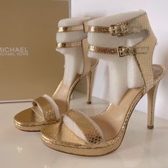 Brand: Michael Michael Kors Style: Ashby Sandal Material: Metallic Leather Color: Gold Size 7.5 / 38 Heels: ~ 4.25” Brand New In Box! Bronze Heels, Michael Kors Style, Strappy Platform Sandals, Michael Kors Sandals, Michael Kors Fashion, Leopard Heels, Black Pumps Heels, Pumps Heels Stilettos, Suede Block Heels