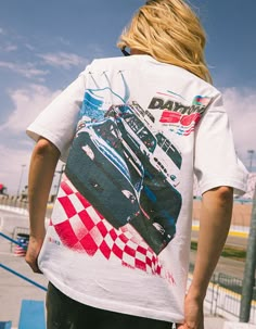 Tillys X Nascar Daytona 500 Boxy Tee. Graphic Screened At Left Chest. Large Graphic On Back. Boxy Fit. Crew Neck. Short Sleeve. 100% Cotton. Machine Wash. Imported. Womens Nascar Outfits, Vintage Nascar Tee, Vintage Nike Shirts, Theta Merch, Unique T Shirt Designs, Nascar Outfit, Perspective Poses, Nascar Daytona 500, Nascar Tee