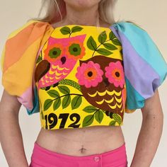 Upcycled tea towel crop top. Bust 34 length 14. Recommend wearing something underneath to prevent indecent exposure. For first dibs on more colorful vintage goods and groovy 70s clothes, check out my Instagram @magicbusvintage. 1970s 60s 1960s canyon orange groovy hippie novelty print pop art statement balloon sleeve Vintage Graphic Print Crop Top, Vintage Crop Top With Graphic Print, Vintage Cropped Crop Top With Graphic Print, Vintage Summer Festival Crop Top, Retro Multicolor Crop Top For Summer, Vintage Crop Top For Summer Festivals, Vintage Cotton Crop Top For Spring, Vintage Festival Crop Tops, Vintage Crop Top For Festival