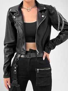 Made from genuine leather, this short-length jacket features long sleeves, a full zip closure, and a collared neckline for a sophisticated look. The jacket is lined and has pockets for added convenience. Women's Leather Jacket, Biker Outfit Women, Tight Leather Jacket Outfit, Biker Outfit Ideas, Leather Jacket Sketch, Biker Style Women Outfits, Leather Vest Outfits For Women, Punk Women Fashion, Crop Top Leather Jacket