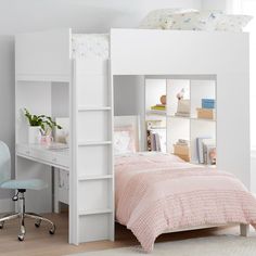 a white bunk bed sitting next to a desk and chair