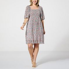 Nina Leonard Printed Smocked Top Dress  Get the perfect figure-flattering shape every time when wearing this sophisticated smocked-waist dress from Nina Leonard.