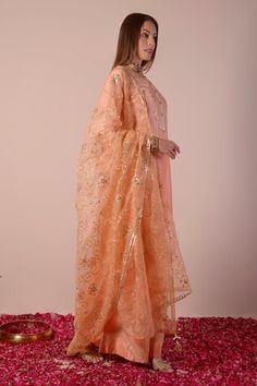 Peach ombre kurta with gota embroidery in chevron pattern. Paired with sharara and floral jaal embroidered dupatta. - Aza Fashions Orange Palazzo Set With Straight Kurta For Wedding, Orange Wedding Palazzo Set With Straight Kurta, Unstitched Orange Palazzo Set For Wedding, Orange Palazzo Set With Sheer Dupatta For Diwali, Orange Chanderi Palazzo Set For Wedding, Orange Palazzo Set For Eid Wedding, Designer Orange Sharara With Chikankari Embroidery, Orange Sharara With Sheer Dupatta For Diwali, Orange Sharara With Sheer Dupatta For Eid