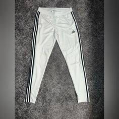 Off-White With Charcoal Grey Stripes. New Condition (Never Worn). White Sports Bottoms With Contrast Stripes, White Athleisure Bottoms With Contrast Stripes, White Adidas Sports Pants, Sporty White Bottoms With Side Stripes, White Stretch Bottoms With Three Stripes, White Sports Pants With Contrast Stripes, White Sporty Pants With Contrast Stripes, Sporty White Pants With Contrast Stripes, Adidas White Bottoms With Three Stripes