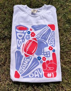 Get this popular NEW touchdown season shirt and show off your team spirit in style!  Each shirt is printed in-house by me using high-quality materials on a Comfort Colors shirt, known for its exceptional comfort, style, and durability. Available in unisex sizes S to 3X, and youth sizes, we've got you covered regardless of your preferred fit. This football game day shirt features a classic crew neck and short sleeves, making it suitable for year-round wear. The flattering silhouette ensures a comfortable and stylish fit for both men and women. Please note that ivory is ONLY available in Adult sizes!  Note: As each shirt is individually printed, slight variations in color and placement may occur, adding to the uniqueness and charm of your Stacked Bulldogs Shirt. Your shirt will come with car Bulldogs Shirt, Tailgate Shirt, Bulldog Shirt, Shirt Football, Game Day Shirts, Comfort Colors Shirt, Football Game, Football Games, Comfort Style