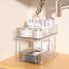 a bathroom shelf with soap, lotion and other items