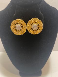 Vintage Signed Nettie Rosenstein Gold Colored with Marcasite (?) in the Middle Clip-On Earrings, 1-1/8" in diameter.  Buyer pays 6 dollars shipping and handling in US only.  Message me with questions. Ornate Round Earrings For Anniversary, Evening Hallmarked Round Clip-on Earrings, Formal Round Hallmarked Plug Earrings, Antique Round Clip-on Earrings For Anniversary, Formal Round Clip-on Plug Earrings, Gold Hallmarked Round Cluster Earrings, Round Cluster Earrings For Evening, Gold Cluster Earrings For Formal Occasions, Formal Byzantine Round Earrings