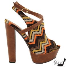 70s Style Never Looked So Good! } Major Block Heel Action To The Tune Of 5.5" } Fabric Chevron In Shades Of Brown, Orange, Yellow And White } Adjustable Ankle Strap } 2" Platform Free Gift With Purchase! Retro Brown Heels With Block Heel, Orange Platform High Heels, Orange High Heel Platform Shoes, Orange Platform Heels With High Heel, Retro Brown Heels For Spring, Bold Orange Open Toe Heels, Retro Brown Platform Heels, Bold Orange Heels For Spring, Retro Multicolor Open Toe Heels