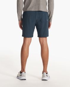 One short for every sport, the Kore Shorts have a classic athletic fit, falling just above the knee with an anywhere and everywhere versatility. Go commando in confidence with the breathable, boxer-brief liner. Also available in 5" and 9" inseam. | Vuori Kore Shorts | Indigo | XXL Vuori makes premium performance apparel inspired by the active Coastal California lifestyle; an integration of fitness, surf, sport, and art. Breaking down the boundaries of traditional activewear, we are a new perspec Sporty Swim Trunks With Built-in Shorts For Outdoor Activities, Sports Shorts With 4-way Stretch In Recycled Polyester, Bottoms With Built-in Shorts For Outdoor Activities, Recycled Polyester Sports Bottoms, Short Length, Sportswear Bottoms With Built-in Shorts In Recycled Polyester, Sporty Running Bottoms With 5-inch Inseam, Athleisure Athletic Shorts With Built-in Shorts For Outdoor, Sporty Compression Bottoms For Outdoor, Sporty Compression Bottoms For Outdoor Activities