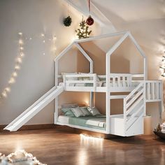 there is a bunk bed with a slide on the bottom and stairs to the top