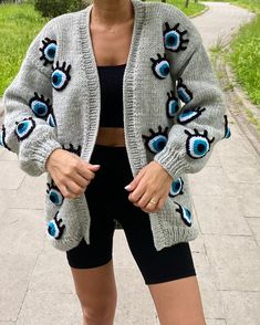 Please contact for different color! Standard size is large size mold. Color : Gray ! - Delivery in 1-3 days - %100 Naturel  - %100 Handmade - Worldwide Shipping! - Hand Wash  - Chunky - Cropped  - For Women Evil eye cardigan is the new cardigan I designed for women! For now, I knit only in gray color. I can also add different colors to the pastry upon request. The eye-shaped cardigan, which is completely hand-knitted, will keep you as warm as a coat in cold winter months. It will be very easy fo Gray Knitted Acrylic Outerwear, Trendy Knitted Gray Cardigan, Gray Knitted Sweater One Size, Gray Knitted One-size Sweater, One-size Knitted Gray Sweater, One Size Gray Knitted Sweater, Gray Long Sleeve Cardigan, Gray One Size Long Sleeve Cardigan, One Size Gray Long Sleeve Cardigan