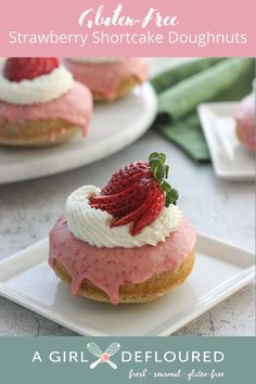 strawberry shortcakes with whipped cream and fresh strawberries on top are ready to be eaten