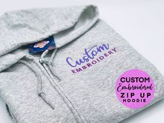 Our current processing time is 3 weeks, if you have a certain date you need your order by please message us prior to purchasing it.    Please reach out to us via Etsy Messages if you have any questions about a future or current order. Thank you for your business!    This embroidered zip up hoodie is made of soft 100% cotton or a poly cotton blend for comfort and is a perfect gift or new everyday staple with your logo! Full zipper pull and front pockets are included, as well as a drawcord hood an Custom Embroidered Fleece Hoodie, Embroidery Hoodie, Hoodie Logo, Personalized Hoodies, Embroidered Hoodie, Workout Sweatshirt, Custom Embroidery, Brushed Cotton, Logo Embroidery